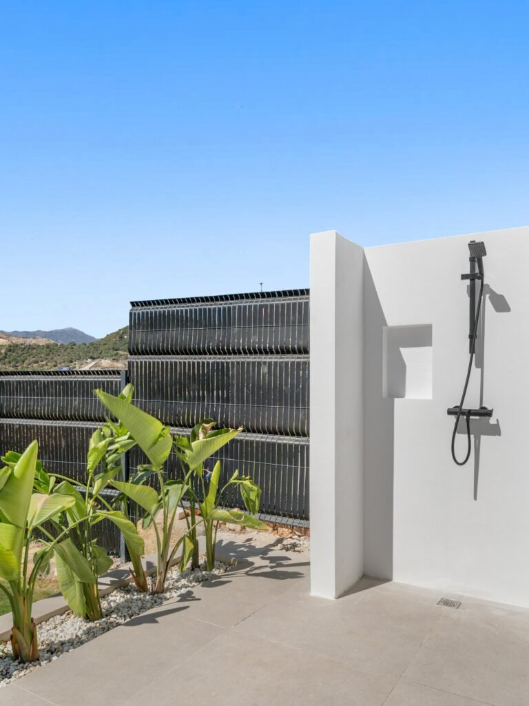 Outdoor shower beside the pool